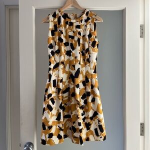 H&M Black and Gold Abstract Mini Dress
